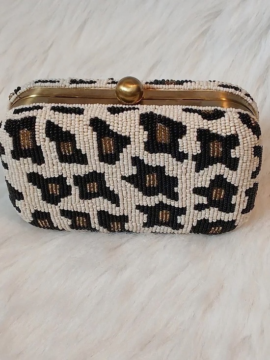 From St. Xavier Handbags - Beaded Leopard-Print Clutch in Black and Cream with Gold Accent